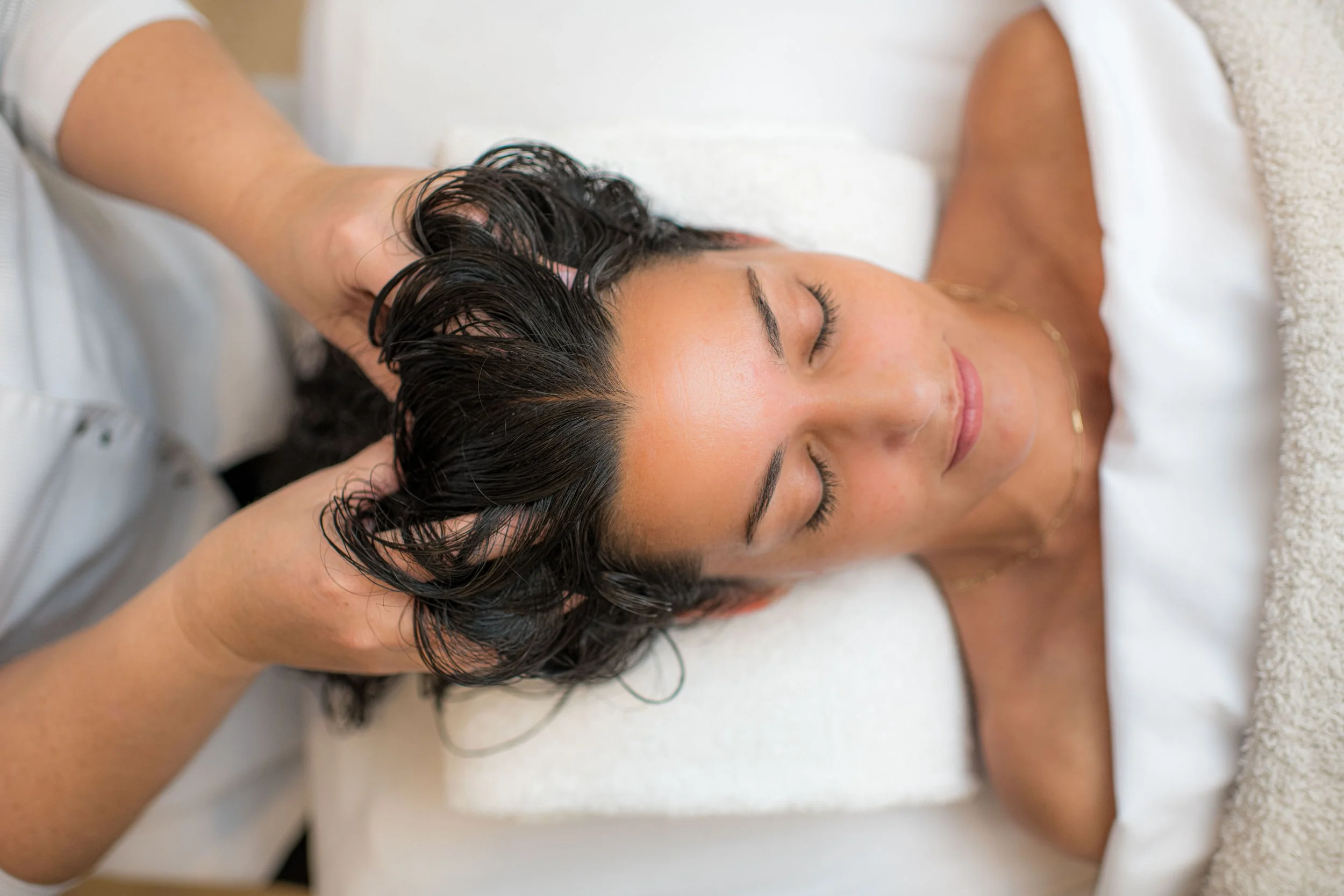 Scalp rejuvenation and hair wellness session in Bolingbrook, IL